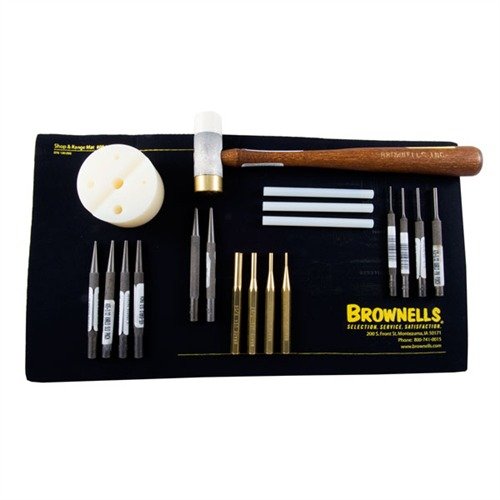 El GUNSMITH MASTER PUNCH SET de BROWNELLS incluye herramientas de alta calidad, un bloque de nylon, martillo y alfombrilla, todo en un estuche duradero.