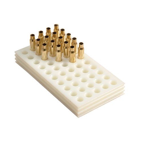 Los bloques de carga de polietileno blanco son duraderos, fáciles de limpiar y tienen ranuras para un mejor agarre, ideales para cartuchos de longitud media y larga.